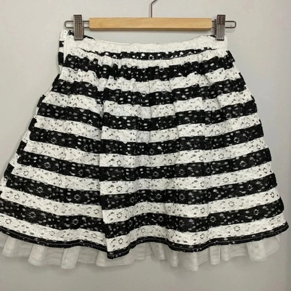 Childrens placeblack and white lace skirt with tullesize 12